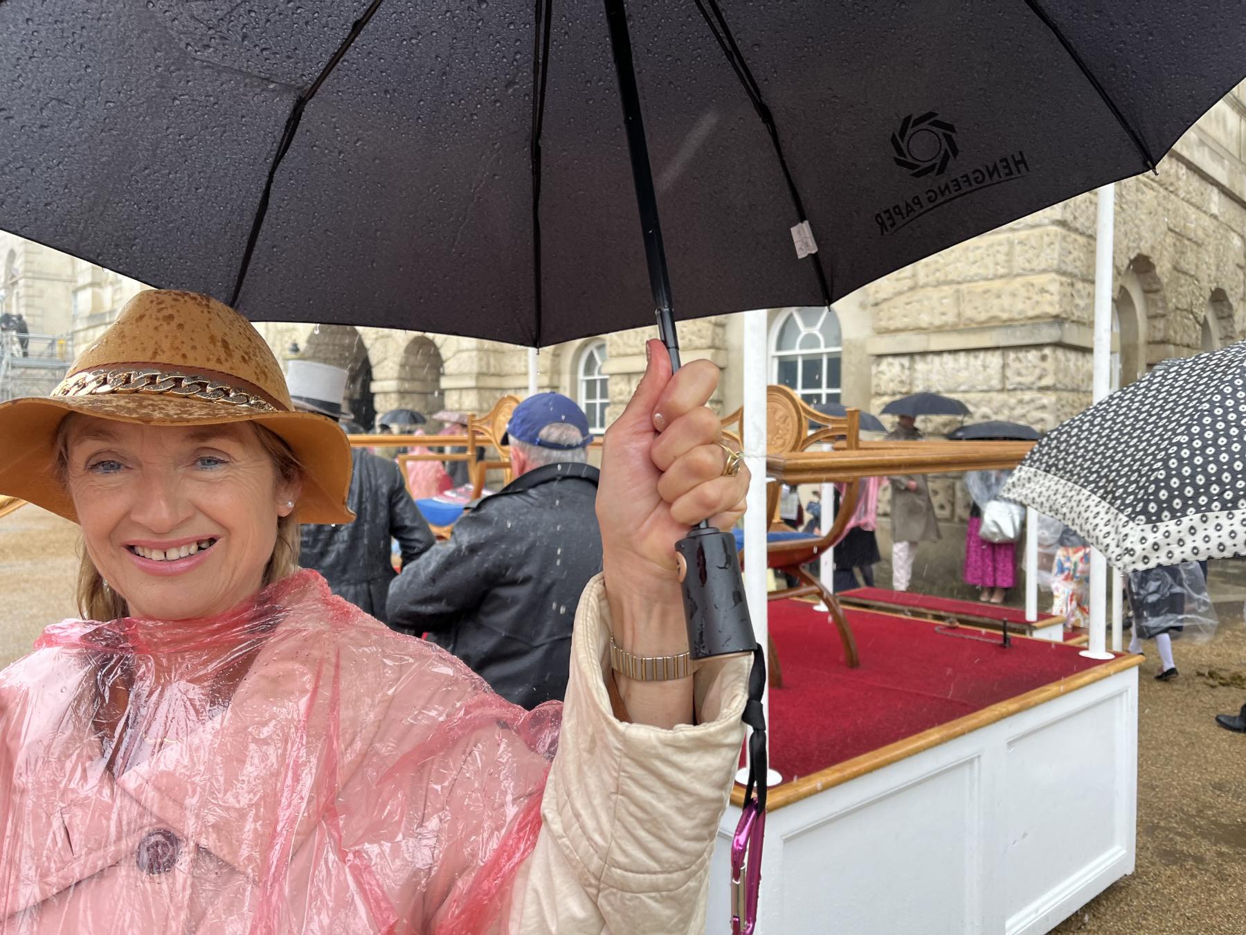 Trying to keep the rain out! 