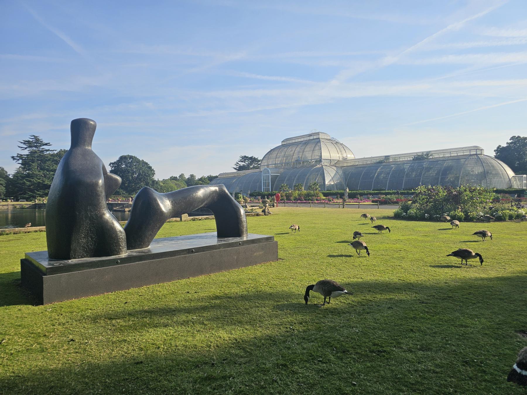 Henry Moore and Palm House with Canada geese Kew Gardens